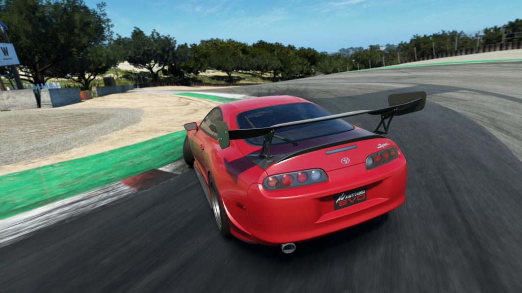 Assetto Corsa EVO gameplay showcasing the detailed tire model and realistic force feedback effects during a wet weather race on track