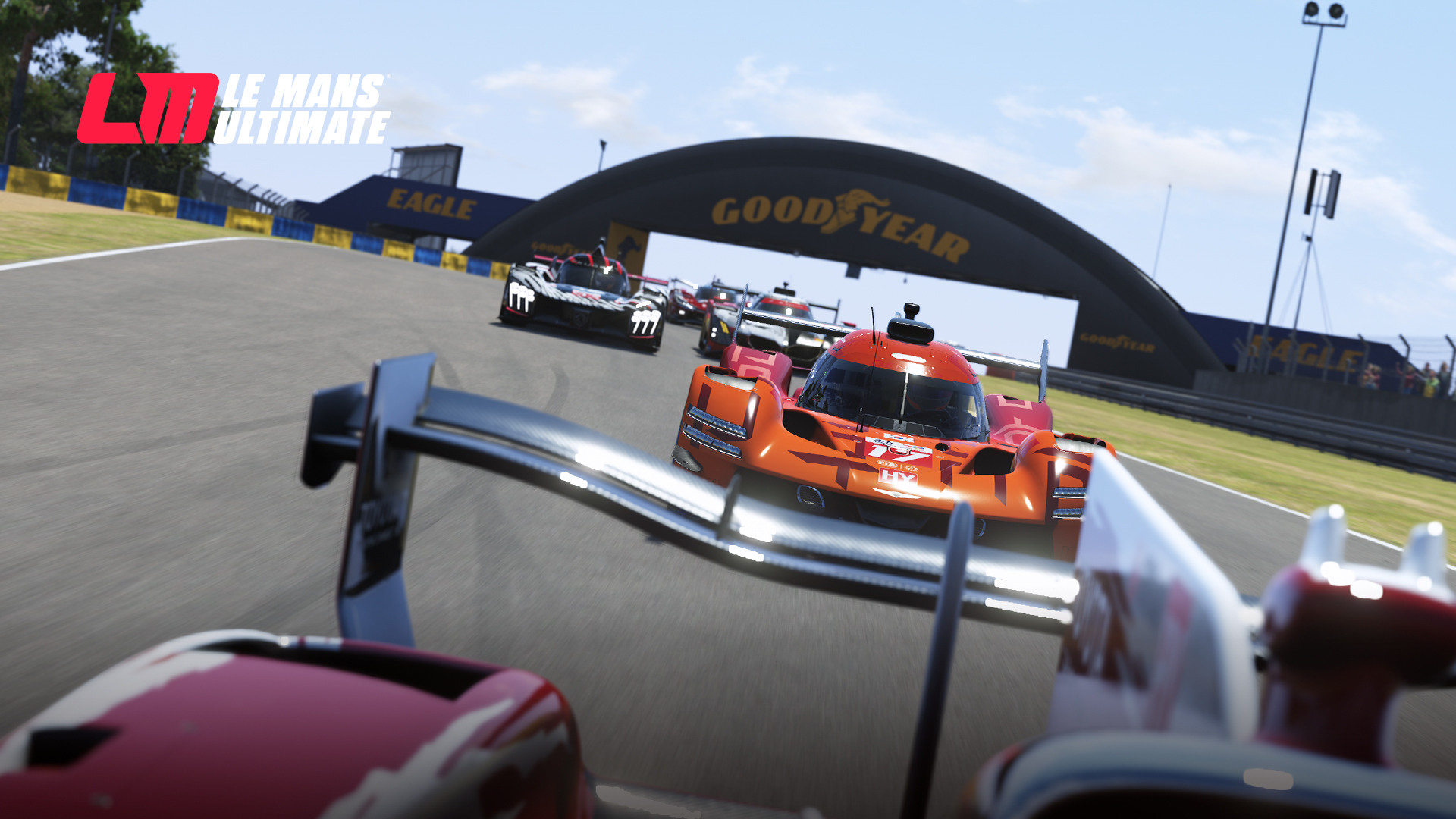 Action shot of Le Mans Ultimate hypercars racing at Le Mans Circuit de la Sarthe